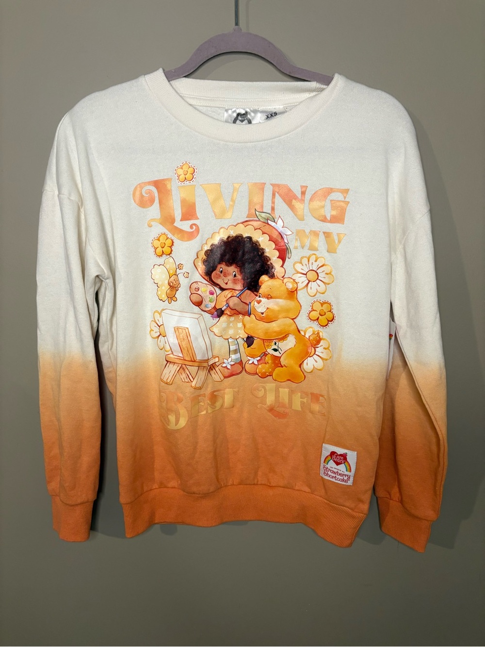 Strawberry Shortcake x Care Bears Women’s Living My Best Life Sweatshirt Kidcore